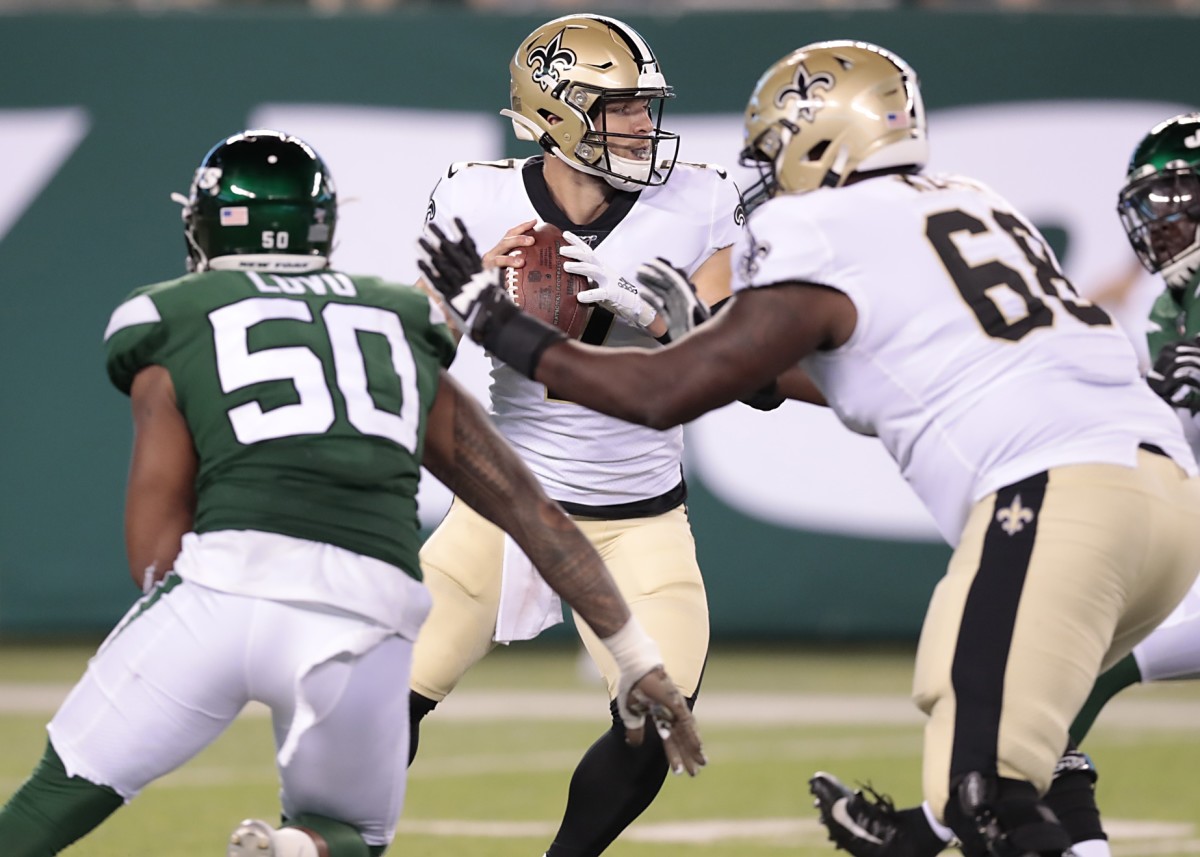 Aug 24, 2019; Jets linebacker Frankie Luvu (50) is blocked by Saints offensive tackle Derrick Kelly (68) during a preseason game. Mandatory Credit: Vincent Carchietta-USA TODAY